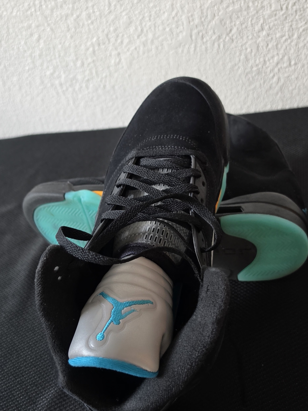 Air Jordan Men’s Black Sneakers with Teal and Orange Accents
